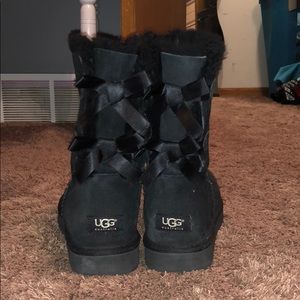 Black ugg boots. Bow on back